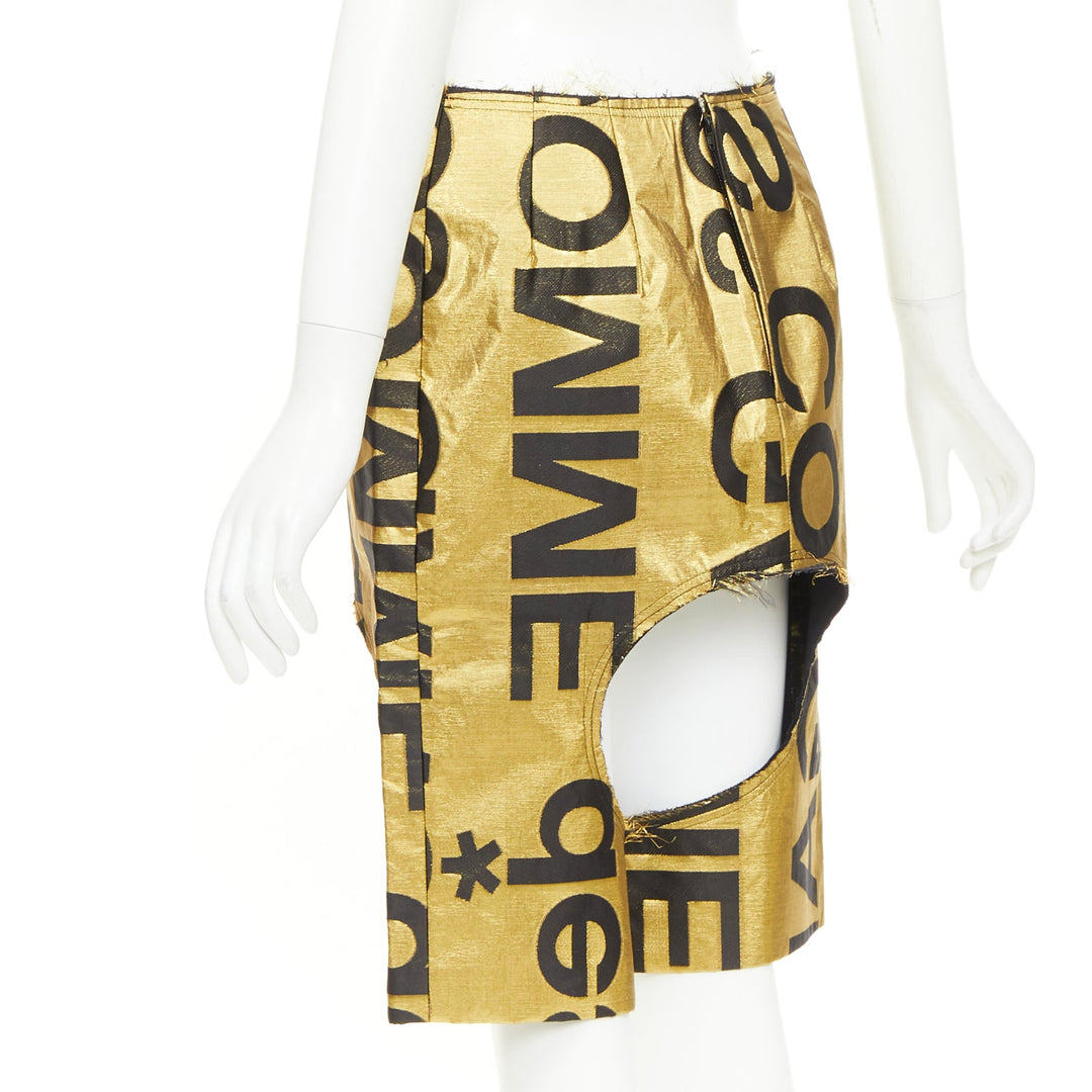 COMME DES GARCONS 2020 Runway gold black polyester silk logo cut out shorts M