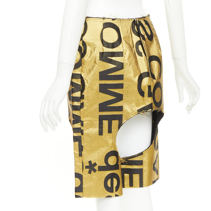 COMME DES GARCONS 2020 Runway gold black polyester silk logo cut out shorts M