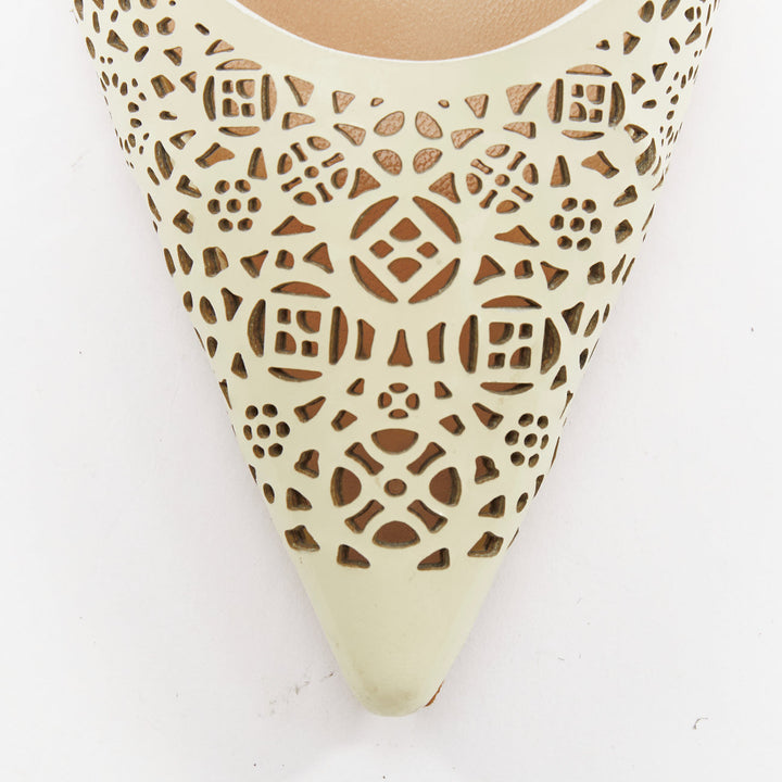 MANOLO BLAHNIK BB70 cream patent leather laser cut slingback kitten pump EU39