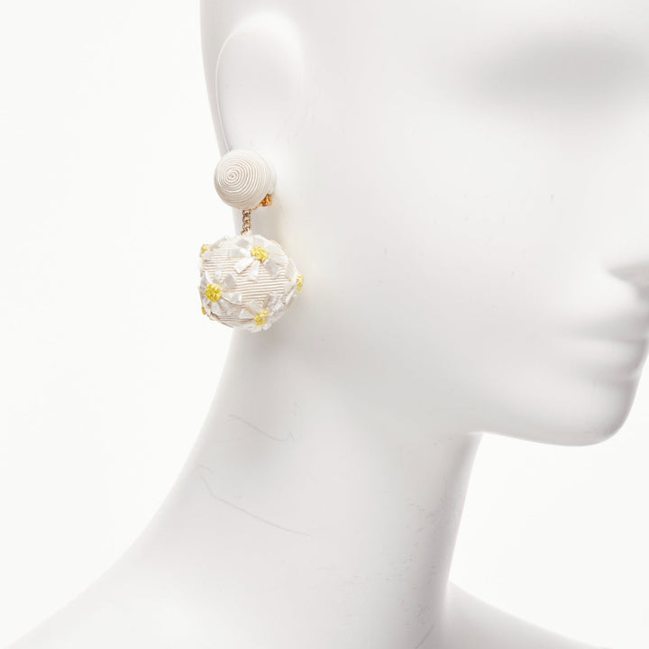 REBECCA DE RAVENEL cream yellow daisy applique clip on drop earrings