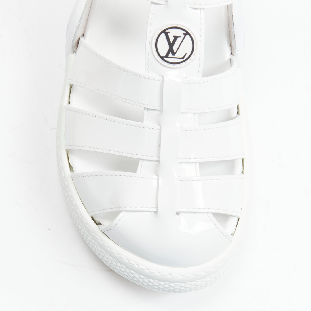 Female mannequin wearing Louis Vuitton by Nicolas Ghesquiere 2022 White Patent Leather Women Sandals in Size EU38 | Available at JHROP