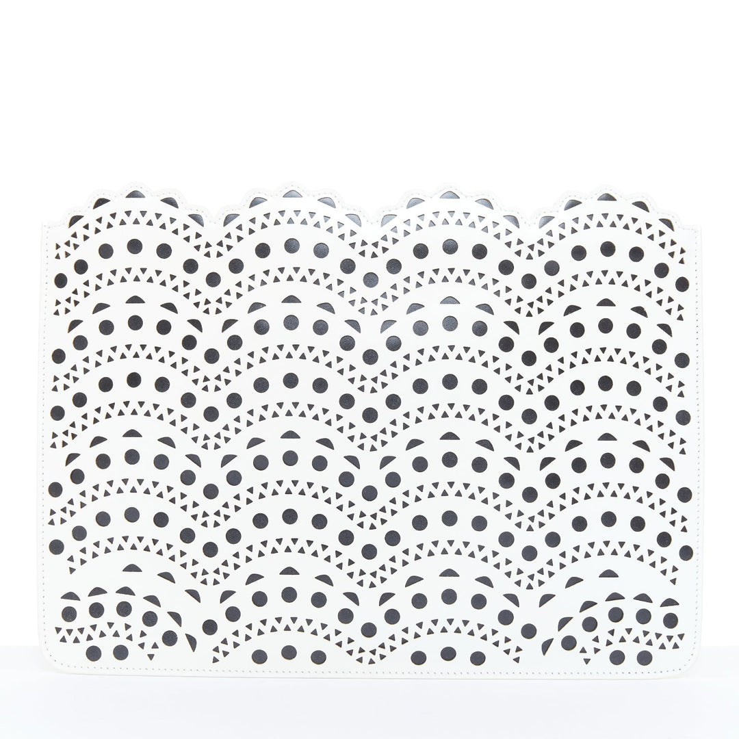ALAIA Vienne laser cut white leather black lined scalloped zip pouch clutch bag