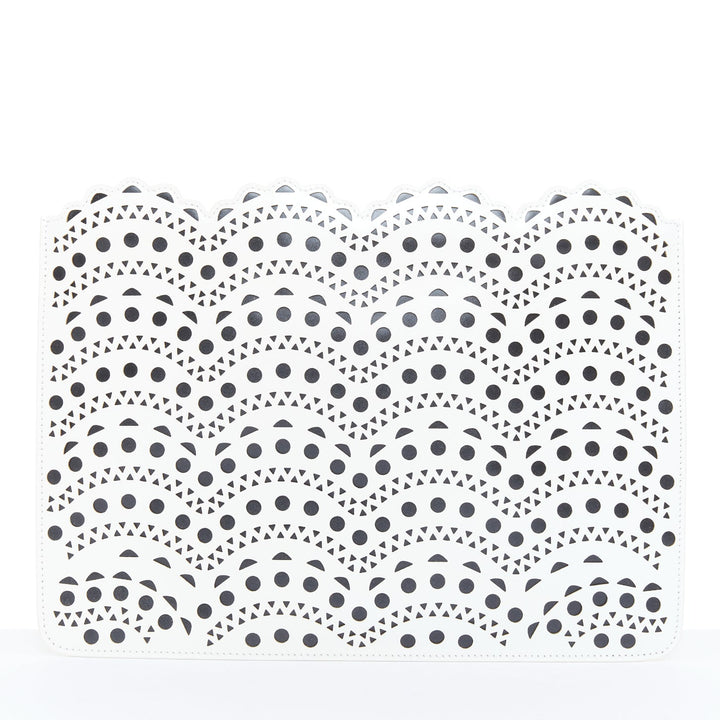 ALAIA Vienne laser cut white leather black lined scalloped zip pouch clutch bag