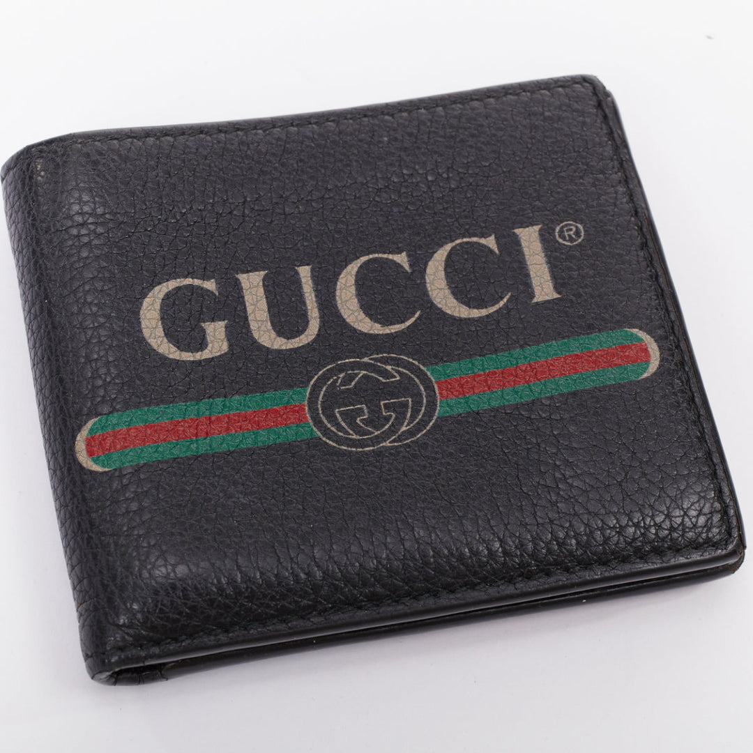 GUCCI black grained leather vintage logo bifold wallet