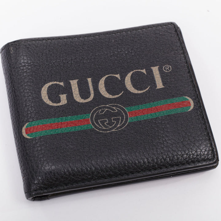 GUCCI black grained leather vintage logo bifold wallet