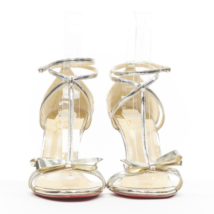 CHRISTIAN LOUBOUTIN Blakissima metallic silver bow t-strap sandals EU37.5