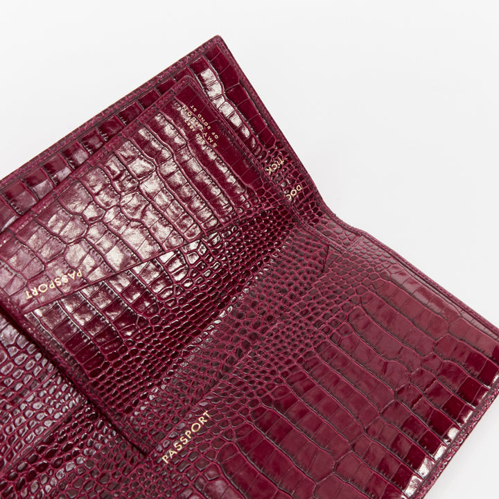 SMYTHSON Mara burgundy croc embossed high gloss teal clasp passport cover