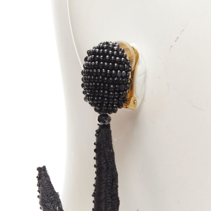 OSCAR DE LA RENTA black Large Starfish bead embellished clip on earrings