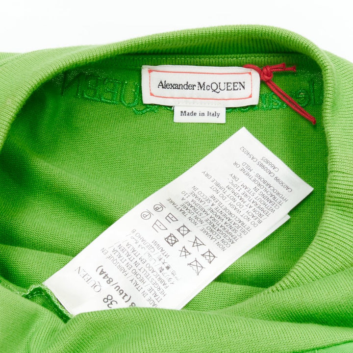 ALEXANDER MCQUEEN 2023 green cotton pleated peplum faille cold shoulder top IT38