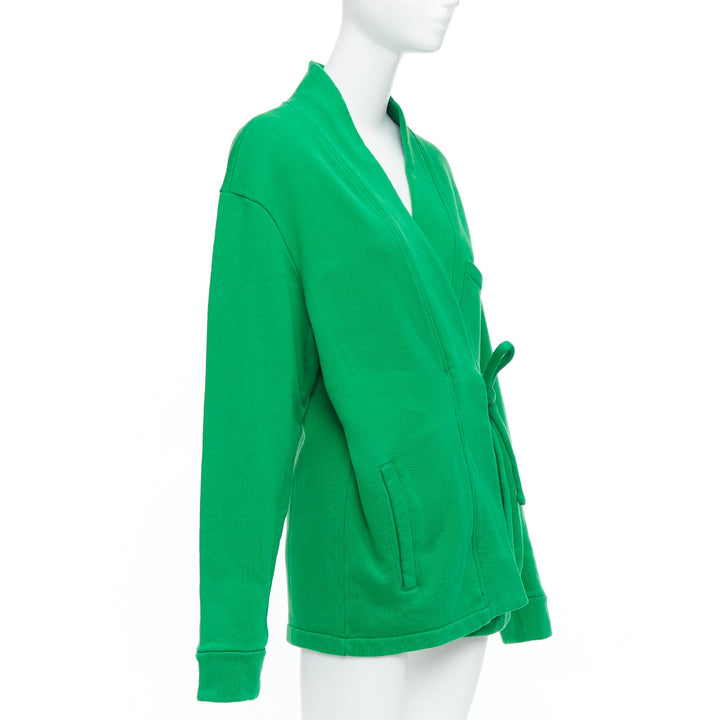 Female mannequin wearing Ambush WKSP Green Cotton Women Coat in Size  S | Available at JHROP