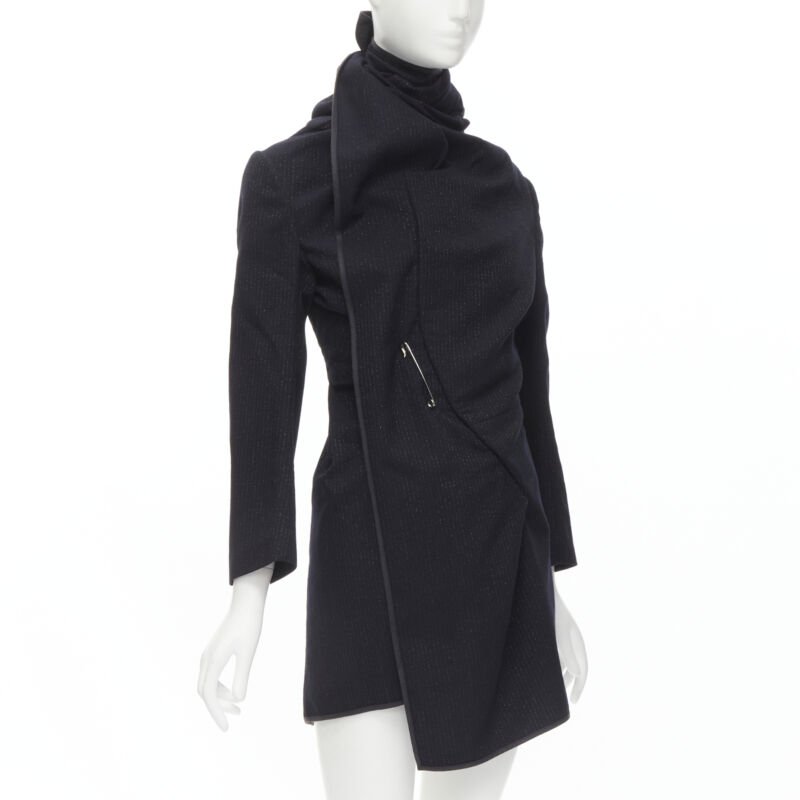 Female mannequin wearing Comme Des Garcons by Rei Kawakubo 1999 Runway Black Wool Women Cape Coat in Size  S | Available at JHROP