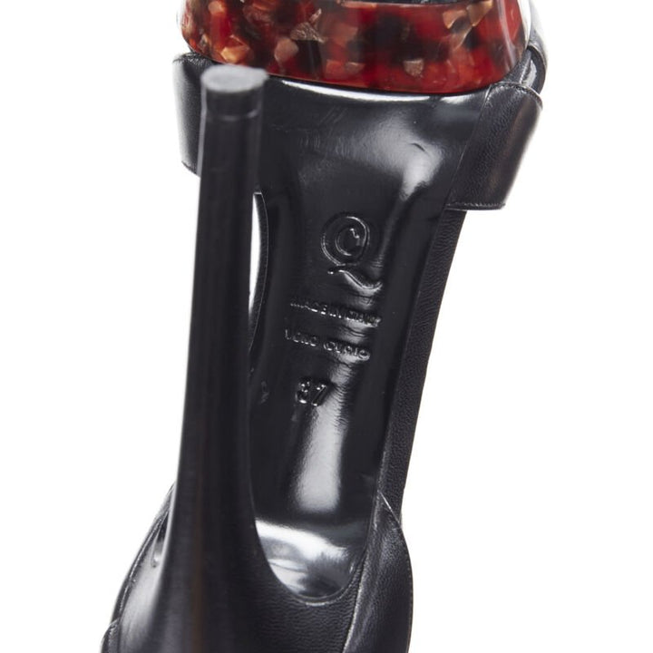 Female mannequin wearing Alexander McQueen Platform sandals Black Leather Women Heels in Size EU37 | Available at JHROP