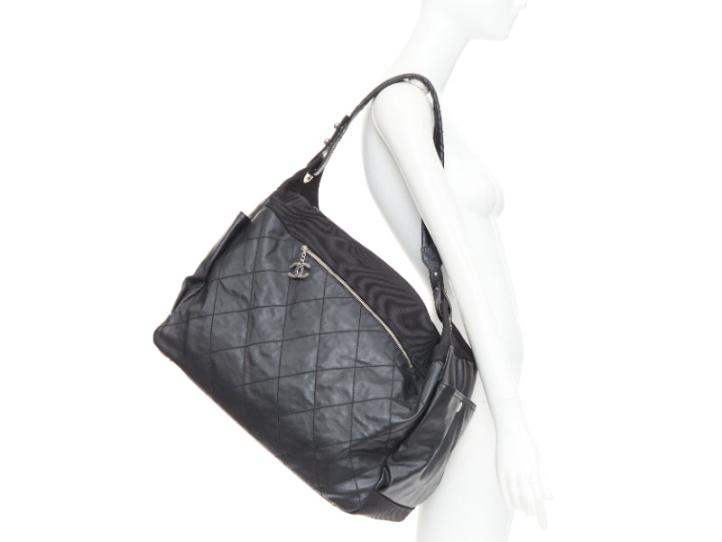 CHANEL XL Paris-Biarritz black coated canvas silver CC crossbody travel hobo bag