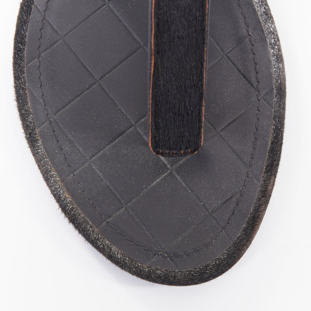CHANEL black pony hair metallic leather CC charm T-strap thong flat sandals EU36