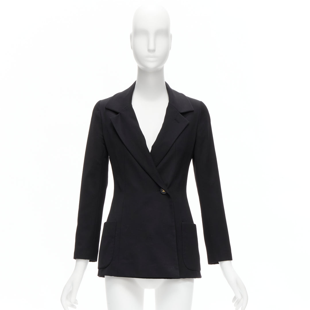 Female mannequin wearing Chanel by Karl Lagerfeld Fall 1994 Black Wool Women Blazers in Size FR34 | Available at JHROP