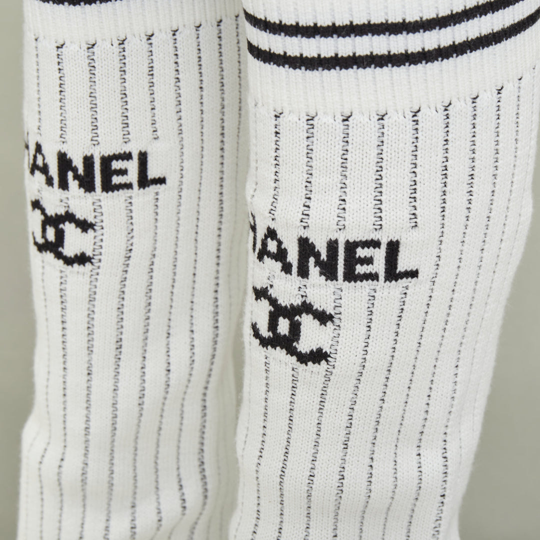 CHANEL 2024 Runway CC logo white black ribbed knit striped trim leg warmers OS