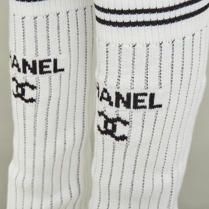 CHANEL 2024 Runway CC logo white black ribbed knit striped trim leg warmers OS