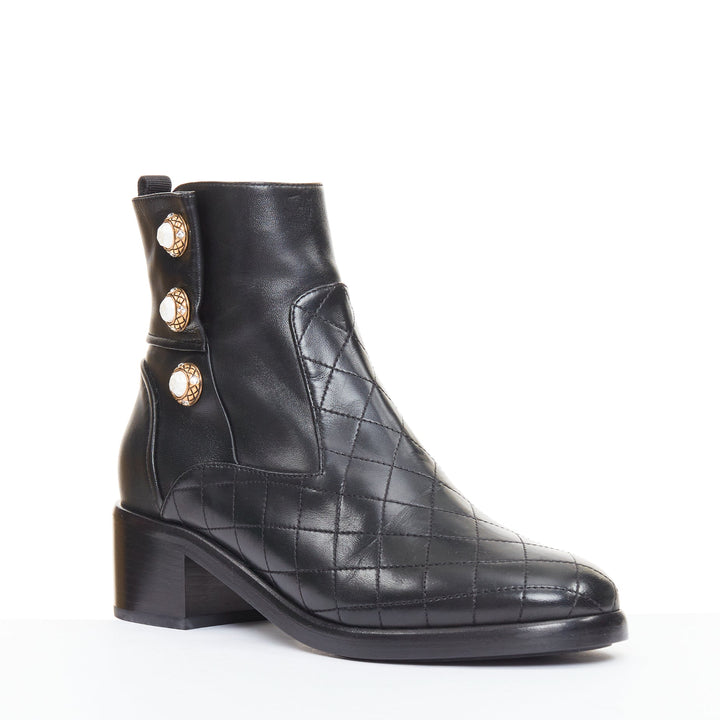 CHANEL 17A Paris Cosmopolite black lamb quilted pearl button ankle boots EU39.5