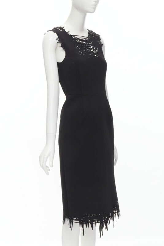 Female mannequin wearing Oscar de la Renta Black Scuba Women Cocktail Dresses in Size  S | Available at JHROP