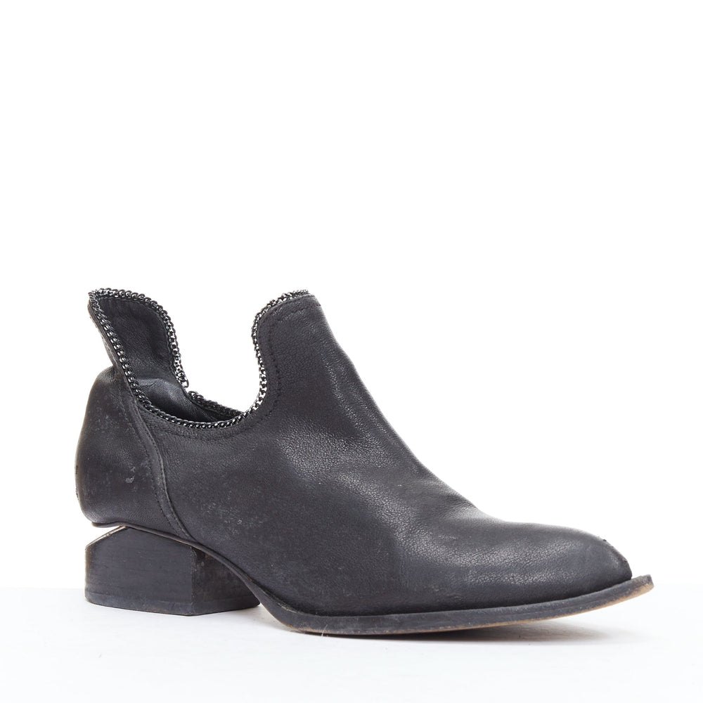 Female mannequin wearing Alexander Wang Black Leather Women Flats in Size EU38 | Available at JHROP