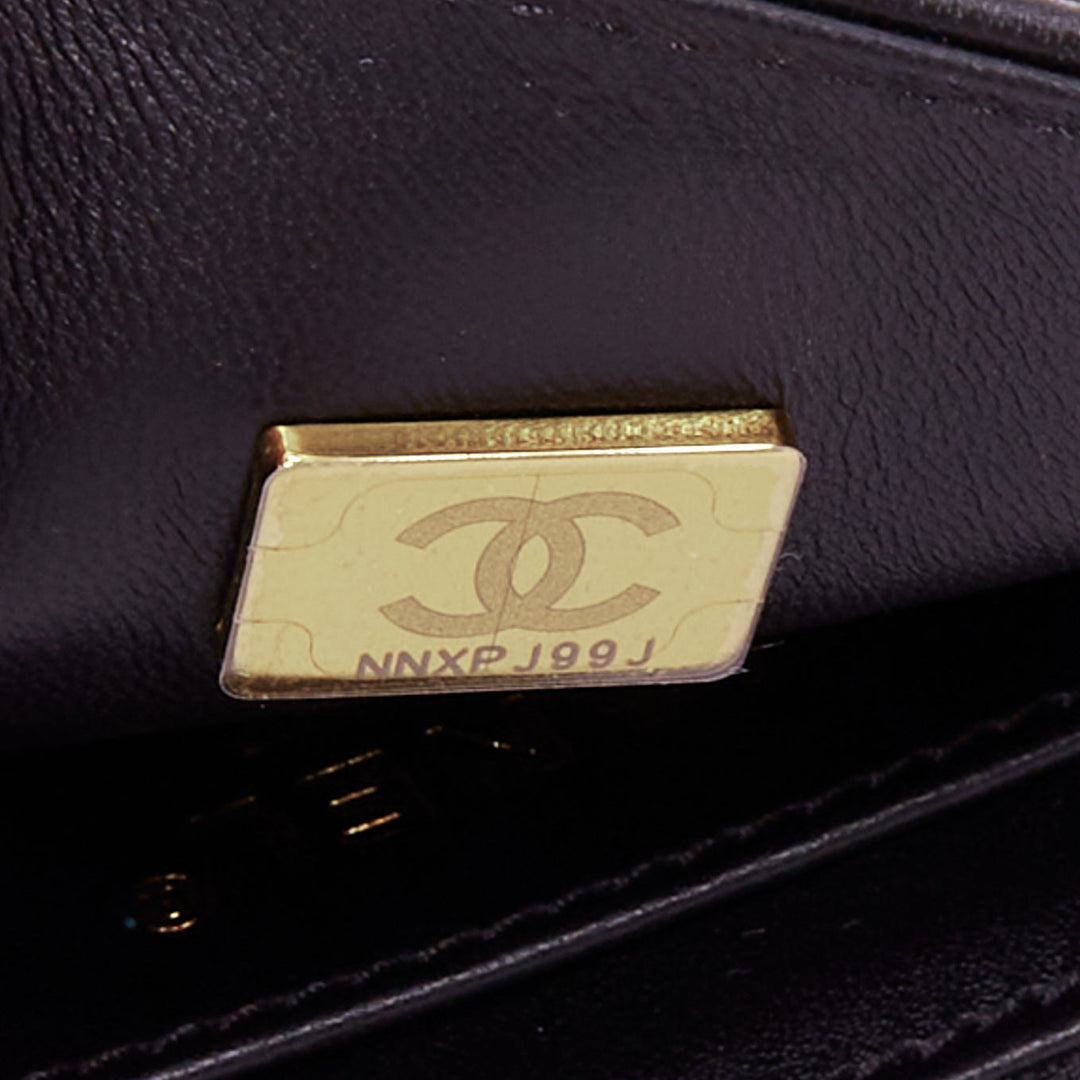 CHANEL 2025 Graphic Frame black quilted lambskin piping mini square flap bag