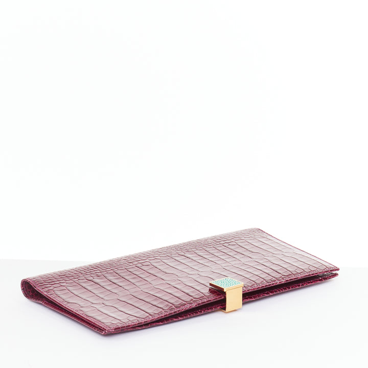 SMYTHSON Mara burgundy croc embossed high gloss teal clasp passport cover