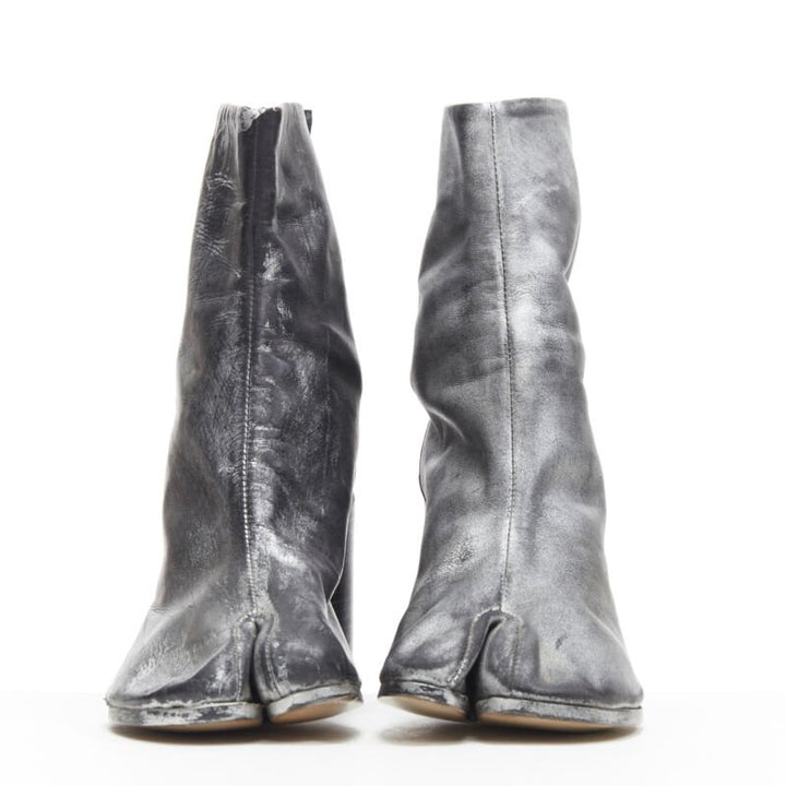 Female mannequin wearing Maison Margiela by Martin Margiela 1990s Runway Silver Leather Women Boots in Size EU39 | Available at JHROP