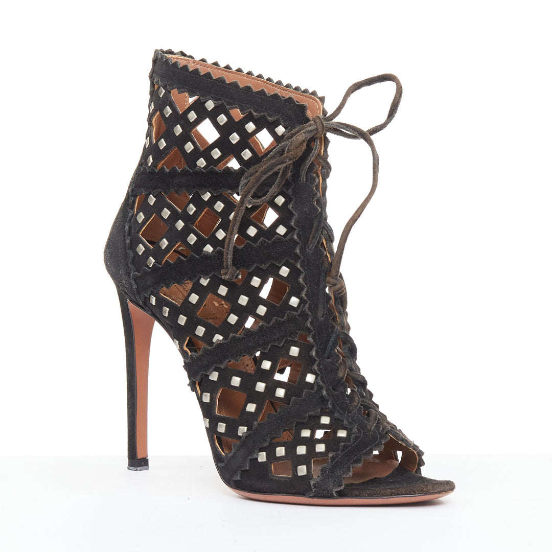 ALAIA black suede laser cut diamond lattice studded cage ankle booties EU35