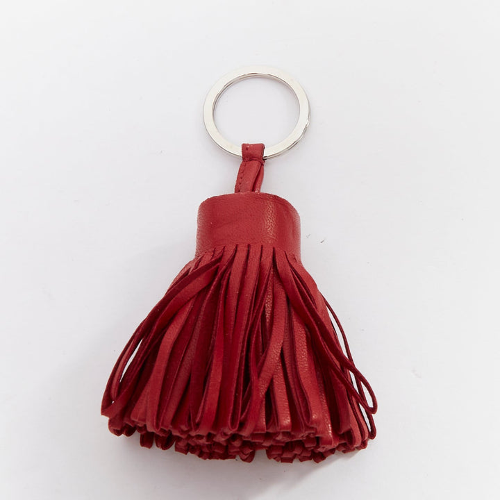 HERMES Milo Carmen red leather tassel silver ring bag charm