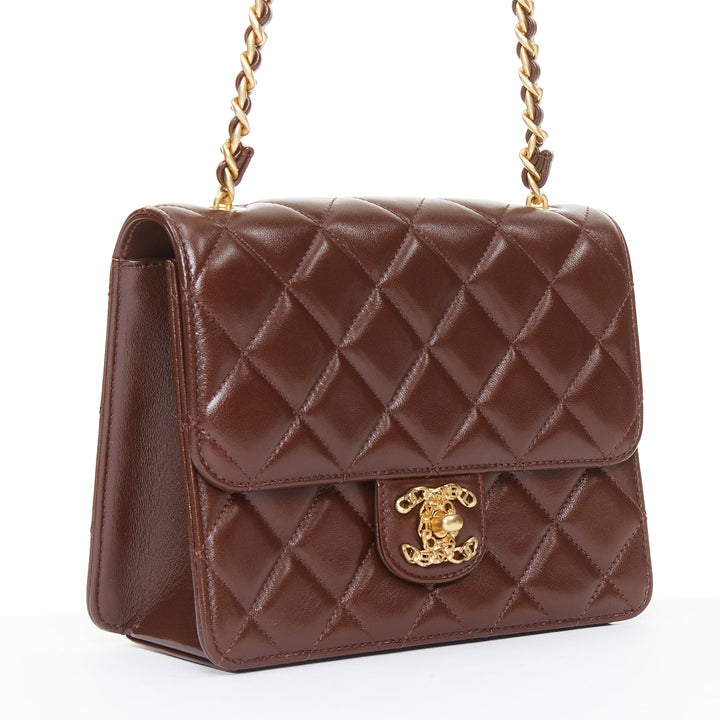 CHANEL 2023 burgundy quilted lambskin ornate CC turnlock seasonal mini flap bag