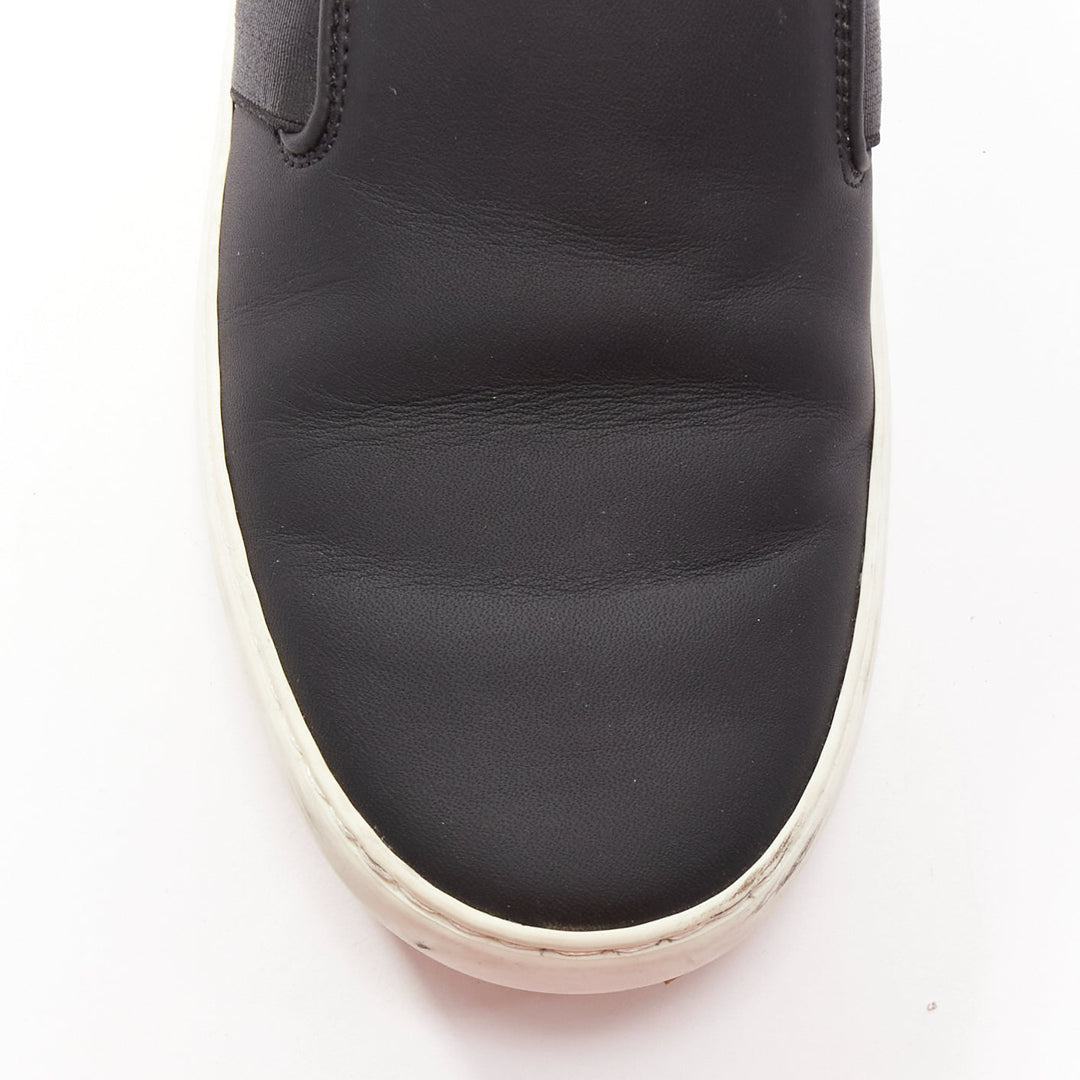 CHANEL black white leather CC logo back minimal classic skates sneakers EU36