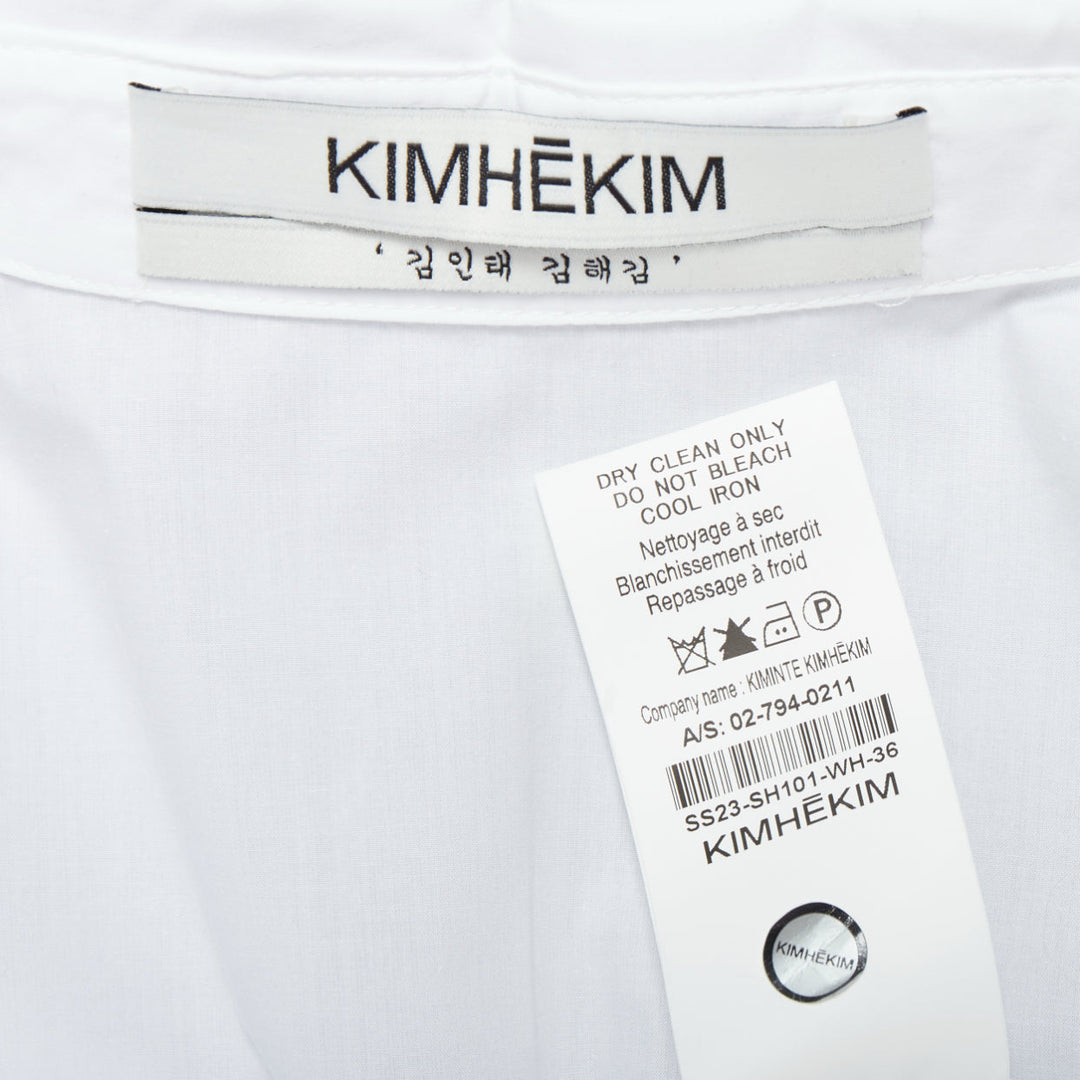 KIMHEKIM NG Belted white cotton asymmetric harness tie shirt FR36 S