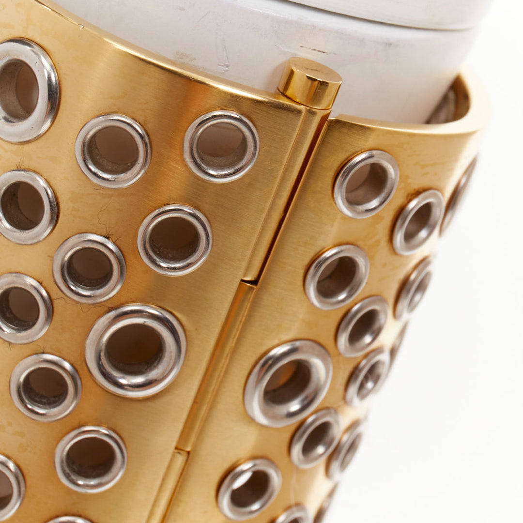 CHANEL B16 gold tone silver CC logo punctured grommet eyelet cuff bangle