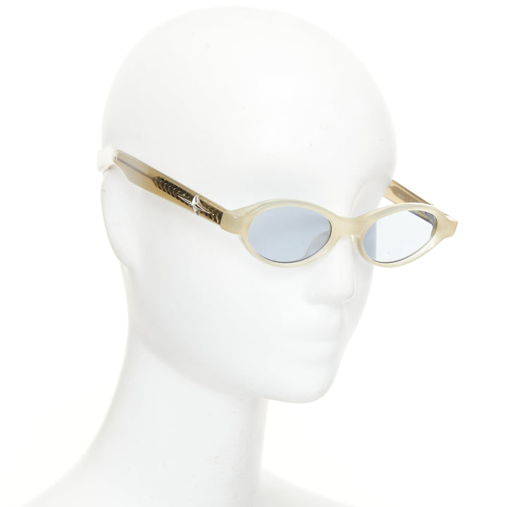 GENTLE MONSTER 2025 BOLD Odd IC3 ivory acetate blue lens oval sunglasses