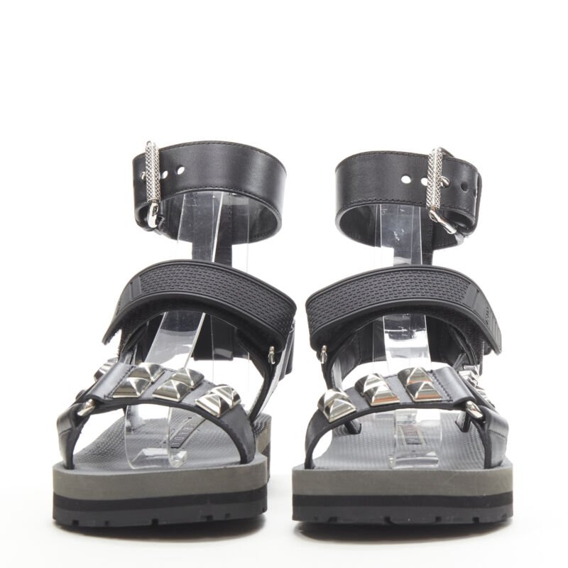 Female mannequin wearing Prada by Miuccia Prada Black Leather Women Sandals in Size EU36 | Available at JHROP