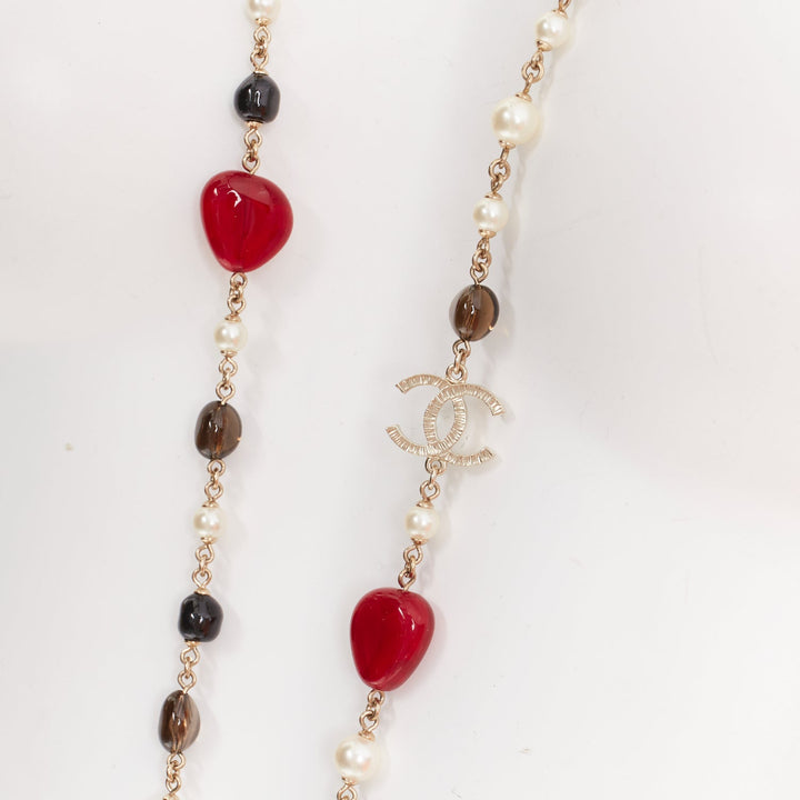 CHANEL A14C red black resin faux pearl CC logo station chain sautoir necklace