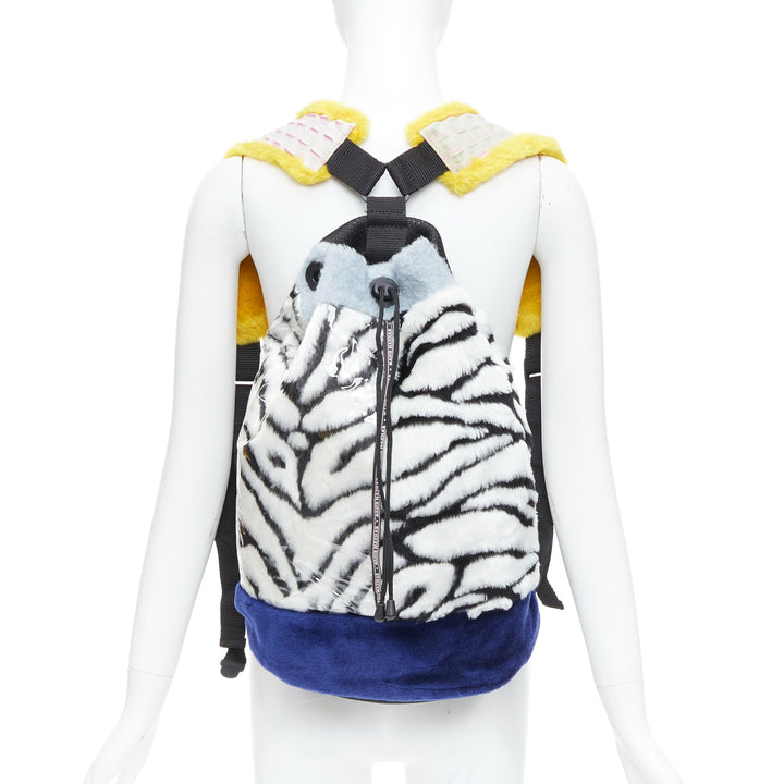 NASIR MAZHAR black white blue yellow faux fur logo tape backpack