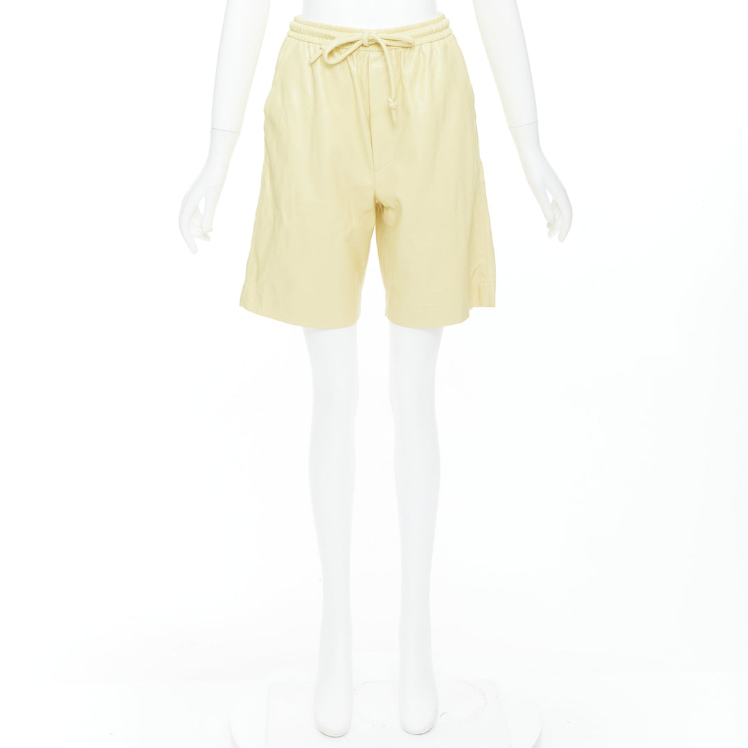 NANUSHKA  Munira Okobor butter yellow vegan leather drawstring bermuda shorts XS