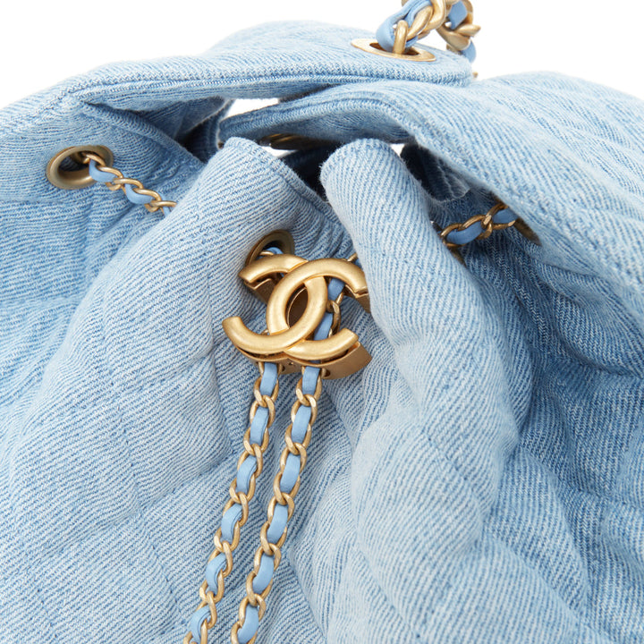 CHANEL Runway 25 Small light blue washed denim gold hardware bucket hobo bag