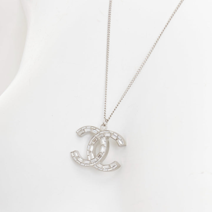 CHANEL 09A silver toned green resin reversible crystal pave CC pendent necklace