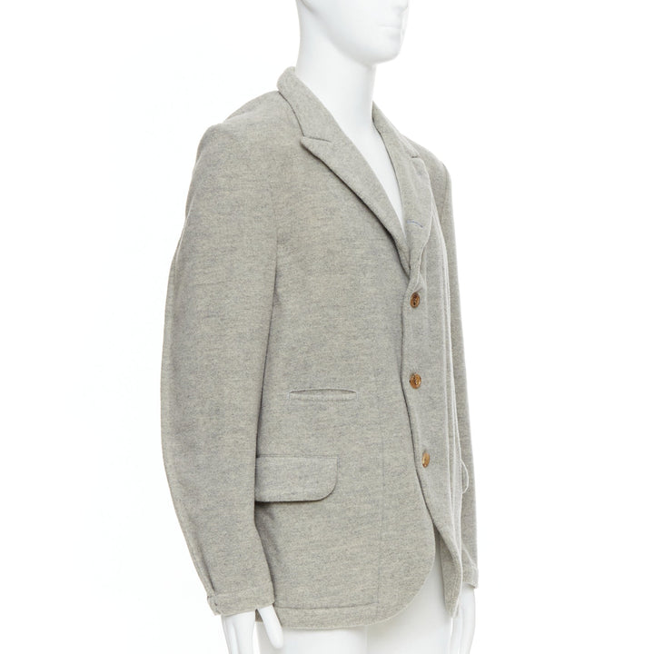 Male mannequin wearing Comme Des Garcons HOMME PLUS 2005 Evergreen Grey Wool Men Blazers in Size  M | Available at JHROP