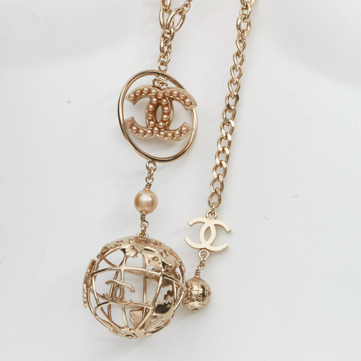 CHANEL 04A gold tone CC logo pearl globe charm chain belt necklace