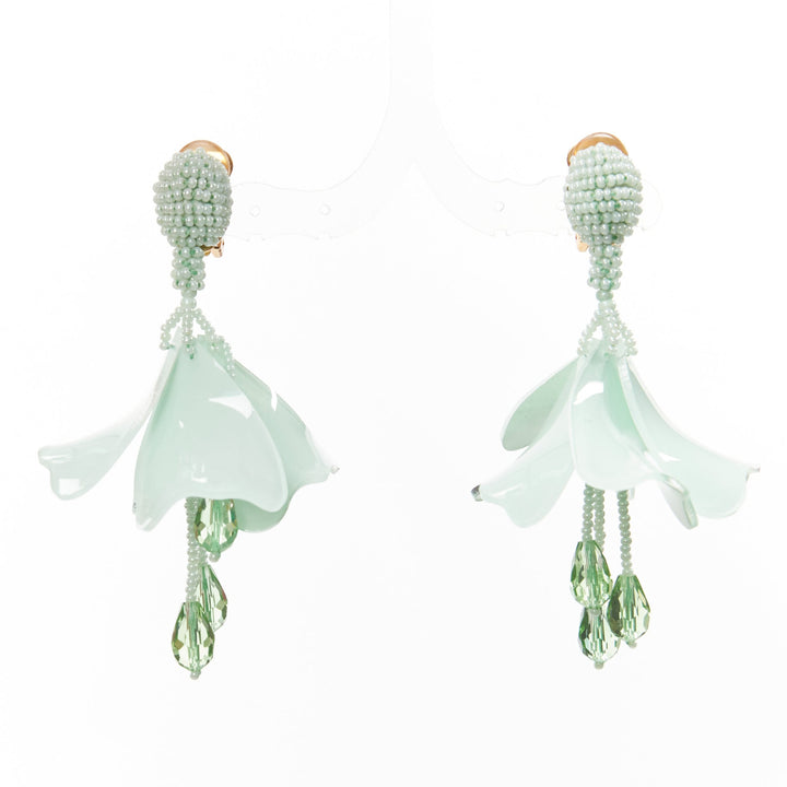 OSCAR DE LA RENTA mint green beaded acrylic flower clip on earrings pair