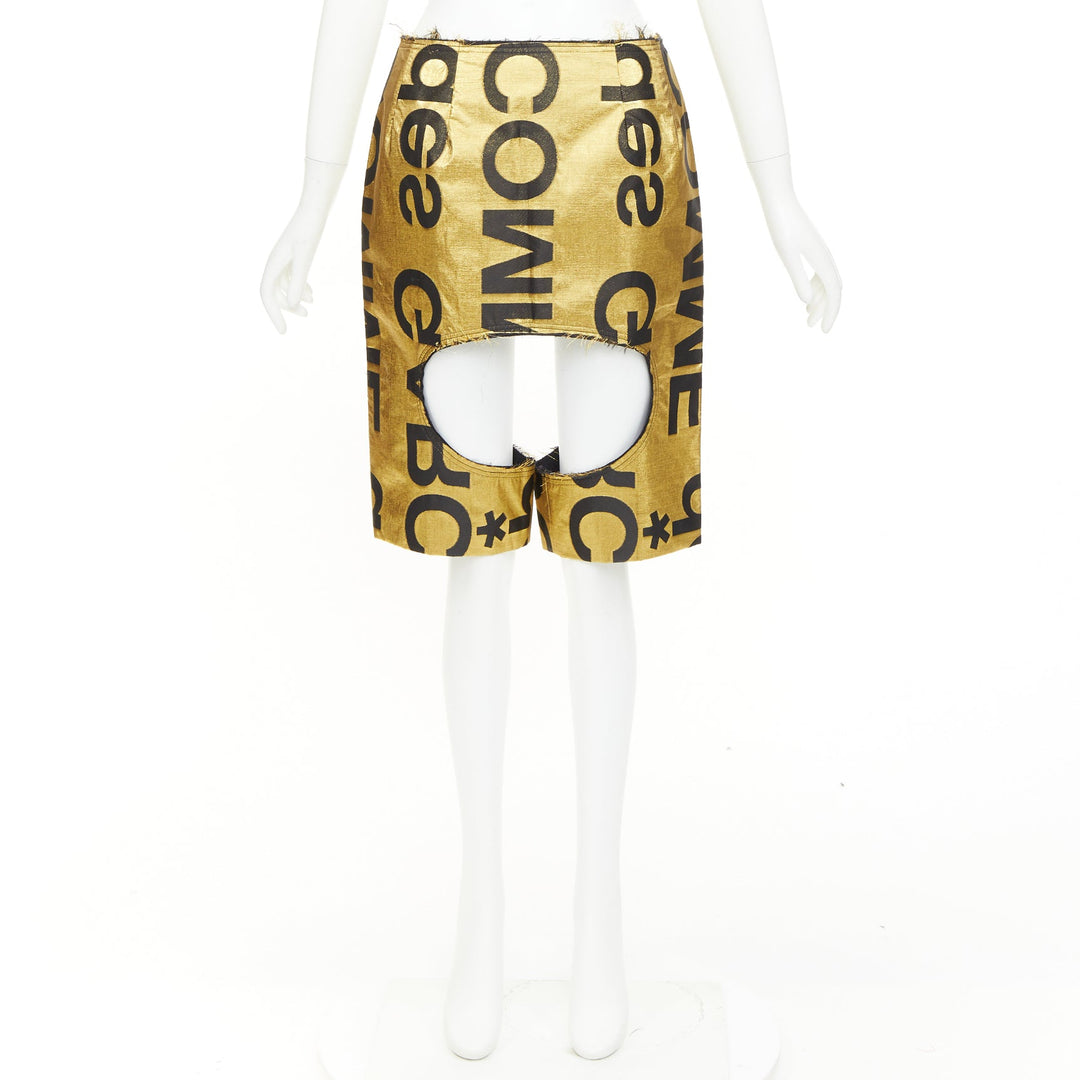COMME DES GARCONS 2020 Runway gold black polyester silk logo cut out shorts M