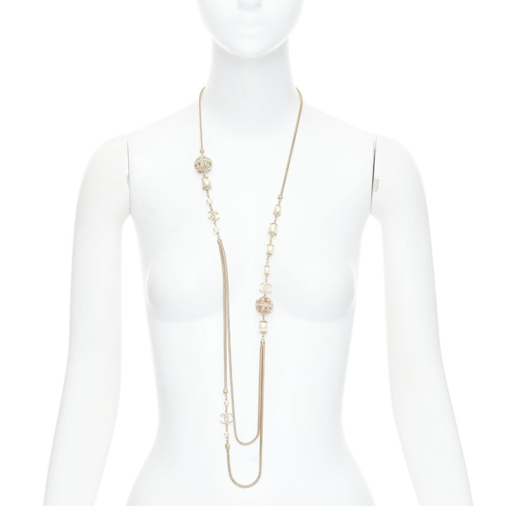 CHANEL B16A gold tone faux pearl CC logo round globes necklace