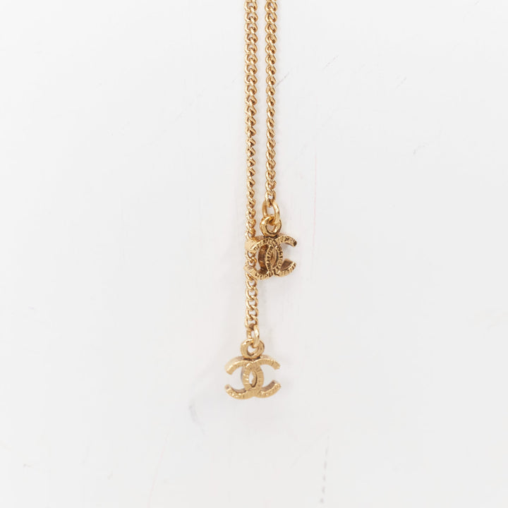 CHANEL 11A aged gold  braided multi link black crystal CC short necklace