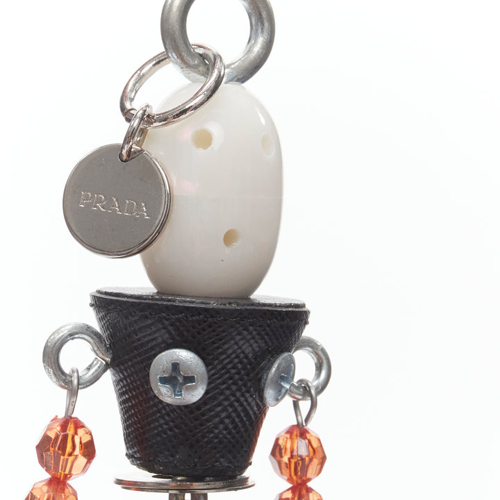 PRADA pearl resin head beaded arms saffiano bolt hardware keychain bag charm