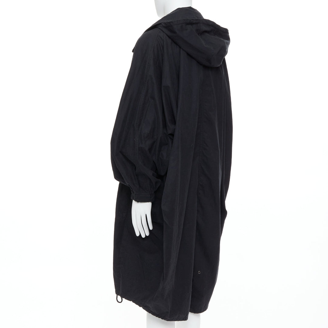 Male mannequin wearing Lemaire Black Cotton Men Coat in Size  3 | Available at JHROP