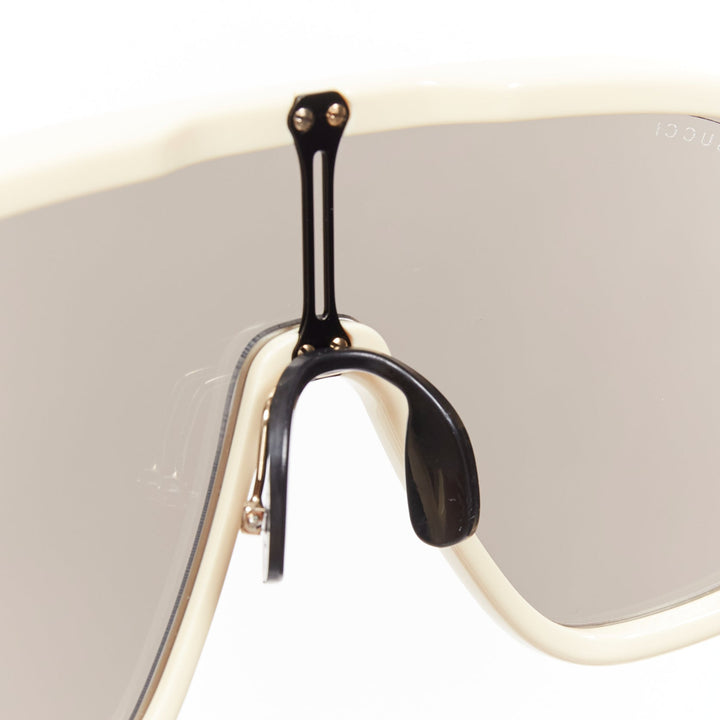 GUCCI GG0900S gold black logo cream frame black lens oversized shield sunglasses