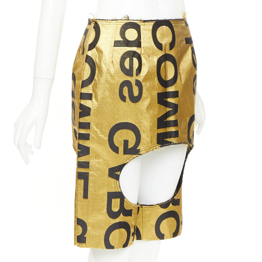 COMME DES GARCONS 2020 Runway gold black polyester silk logo cut out shorts M